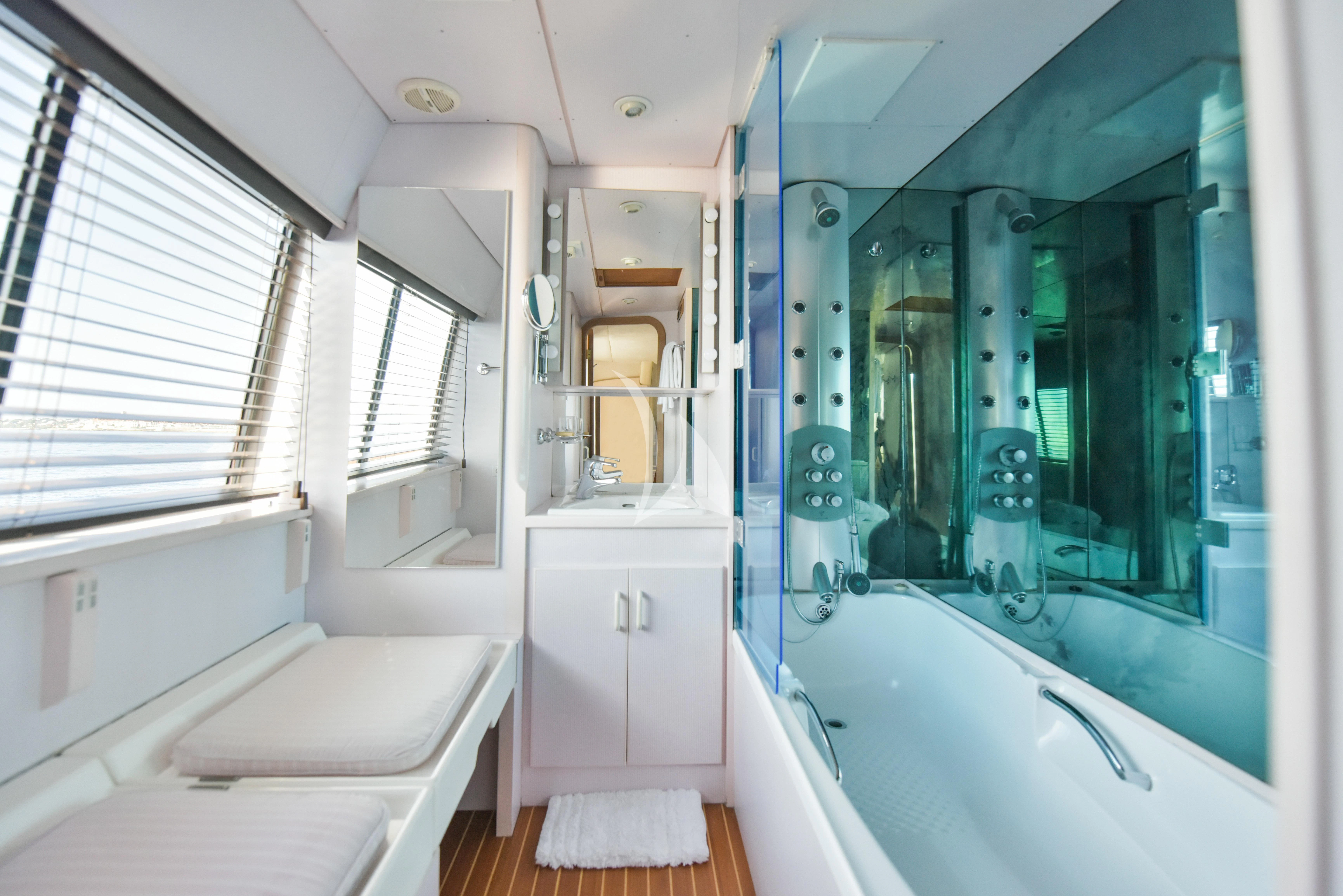 a bathroom with a glass shower aboard ATLANTIC ENDEAVOUR Yacht for Charter