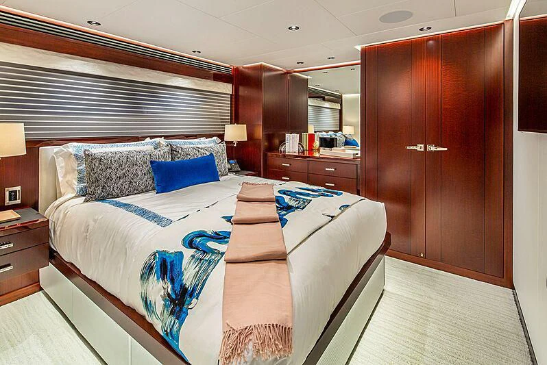 a bed in a room aboard LION'S DEN Yacht for Sale