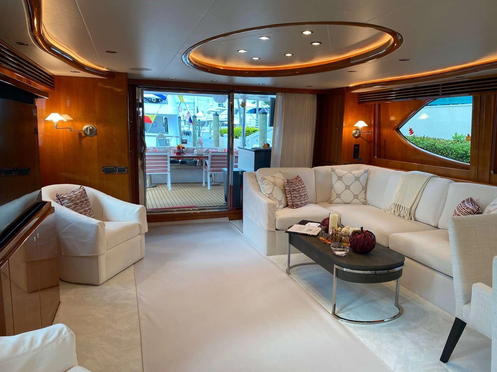 a living room with a large window aboard SLIPAWAY Yacht for Sale