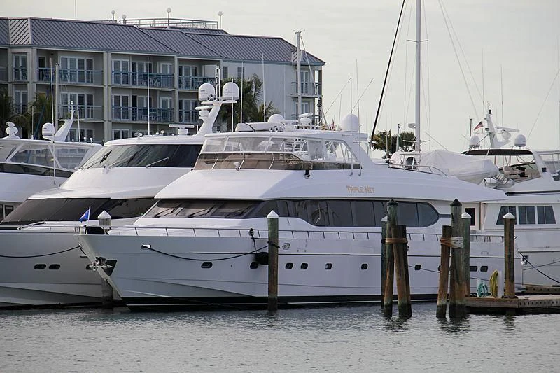 a group of white yachts aboard SLIPAWAY Yacht for Sale