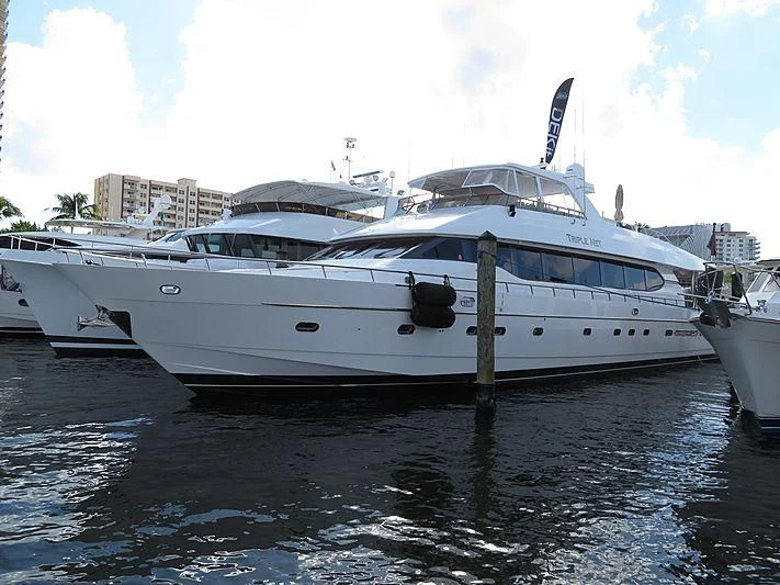 a group of boats in a harbor aboard SLIPAWAY Yacht for Sale