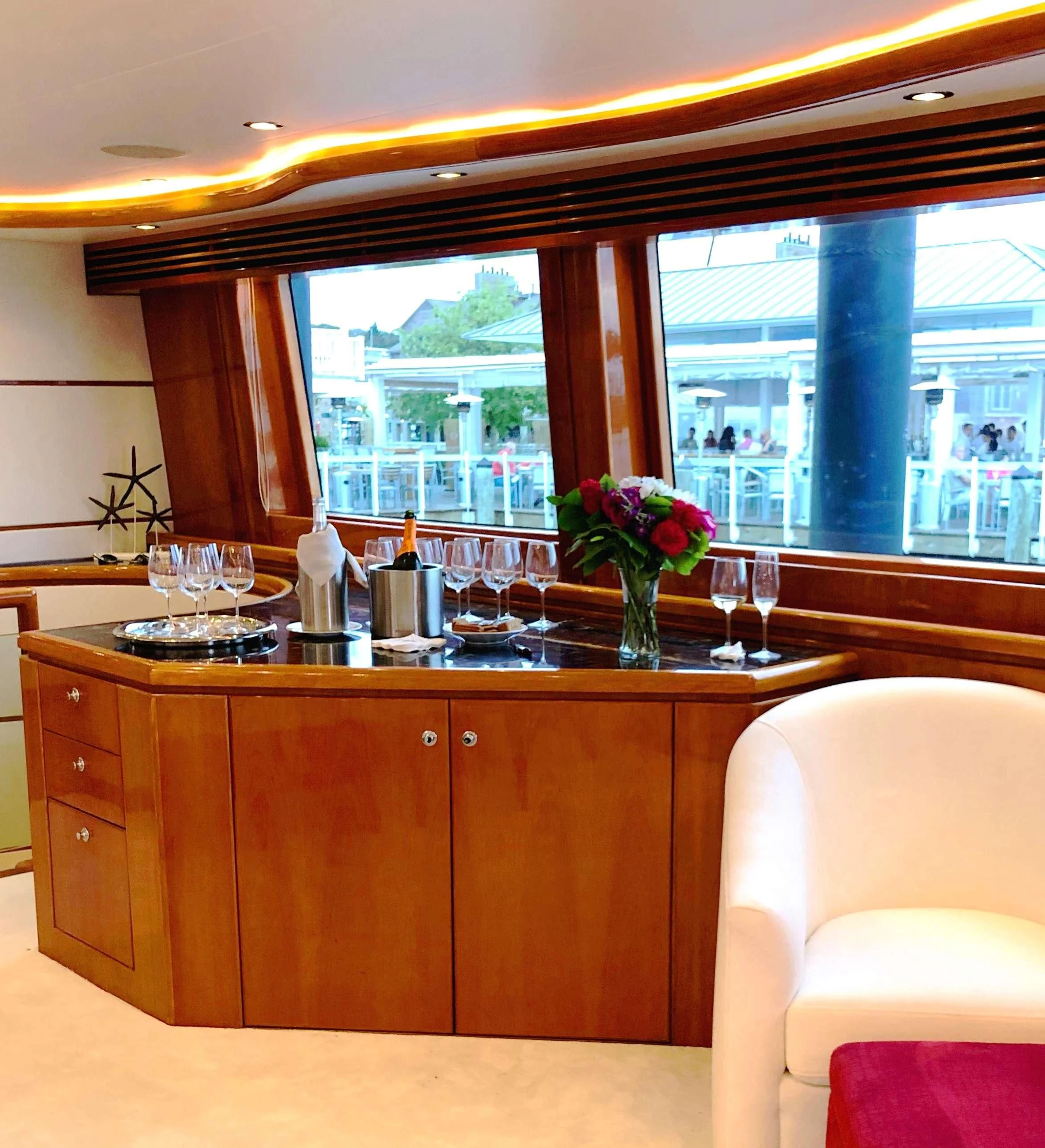 a kitchen with a large window aboard SLIPAWAY Yacht for Sale