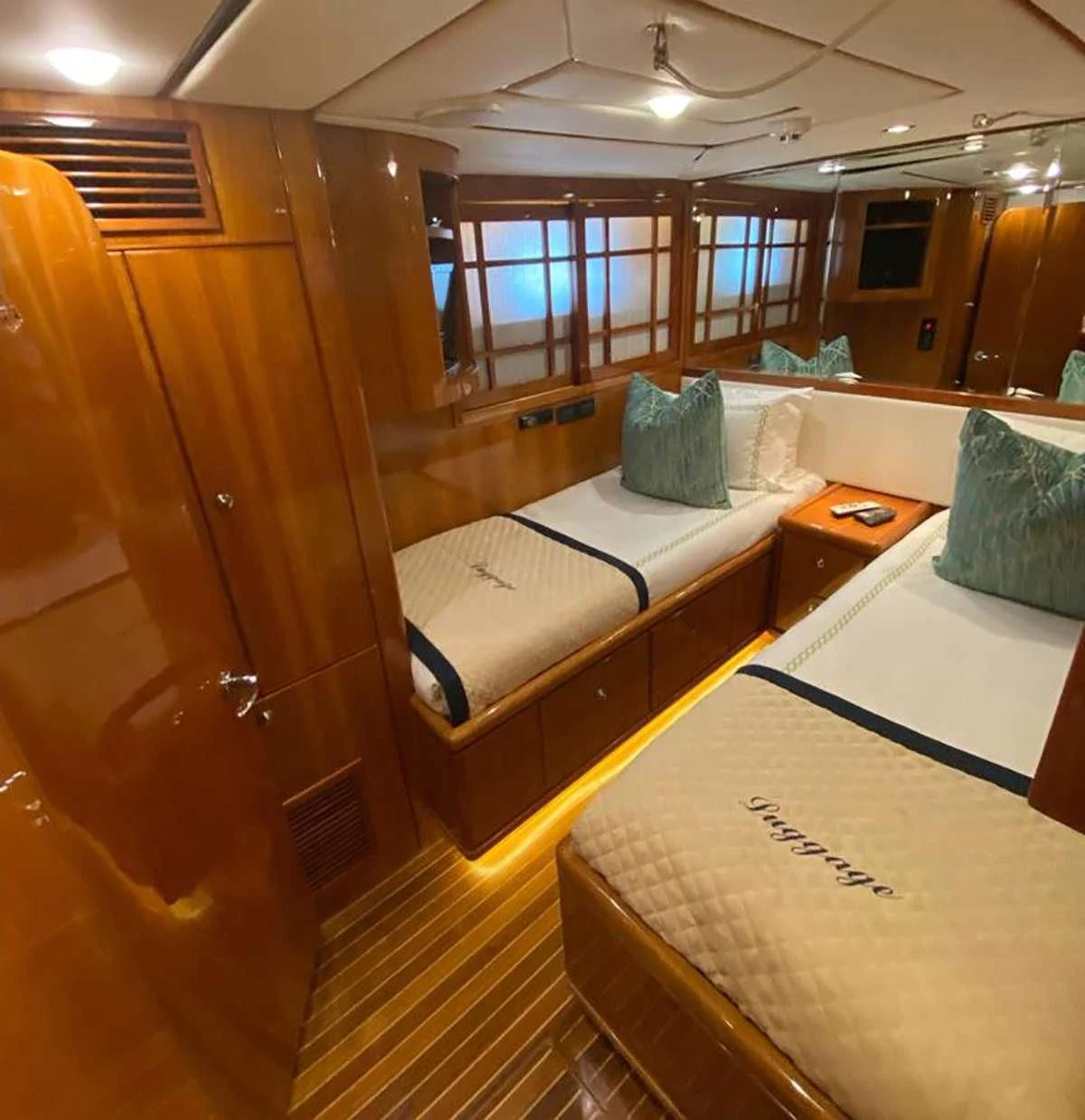 a room with a bed and a desk aboard SLIPAWAY Yacht for Sale