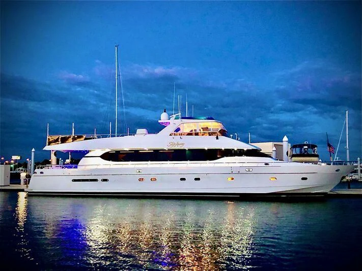 a white yacht in the water aboard SLIPAWAY Yacht for Sale