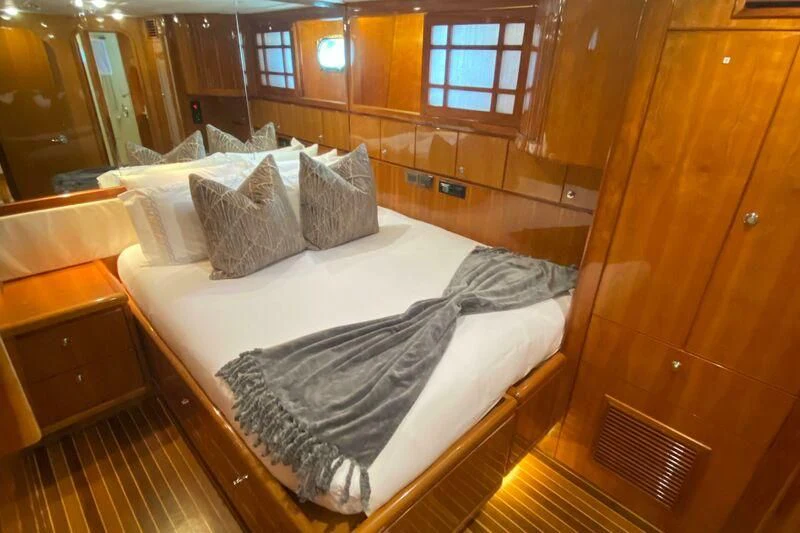 a bed in a room aboard SLIPAWAY Yacht for Sale