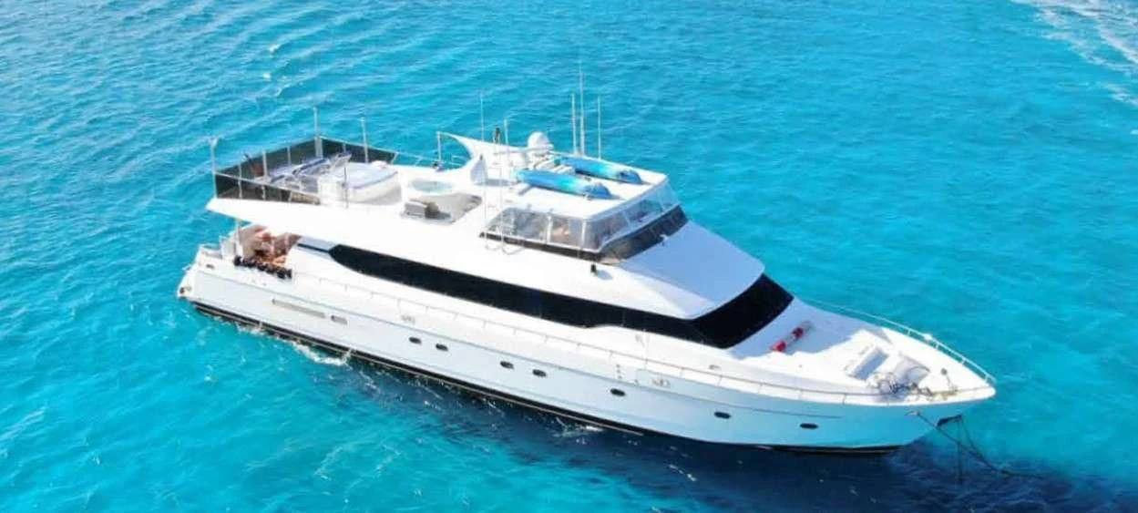 a white yacht in the water aboard SLIPAWAY Yacht for Sale