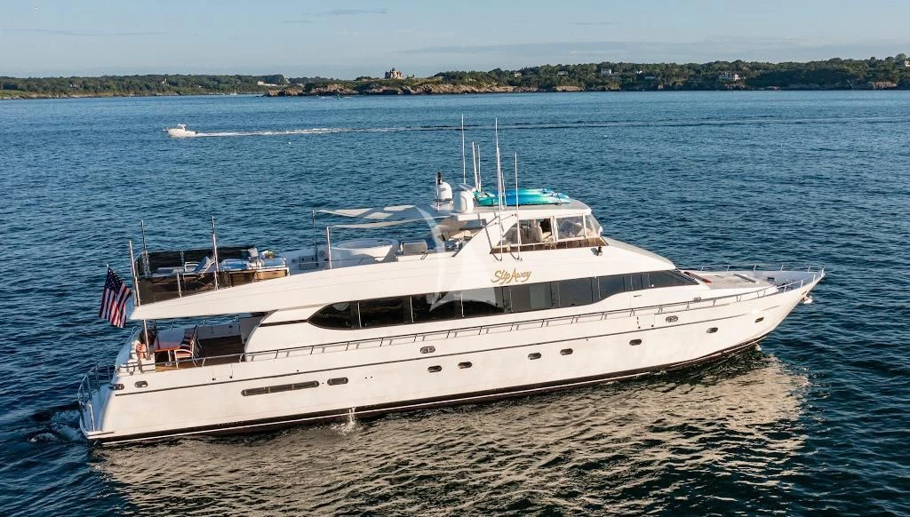 a boat on the beach aboard SLIPAWAY Yacht for Sale