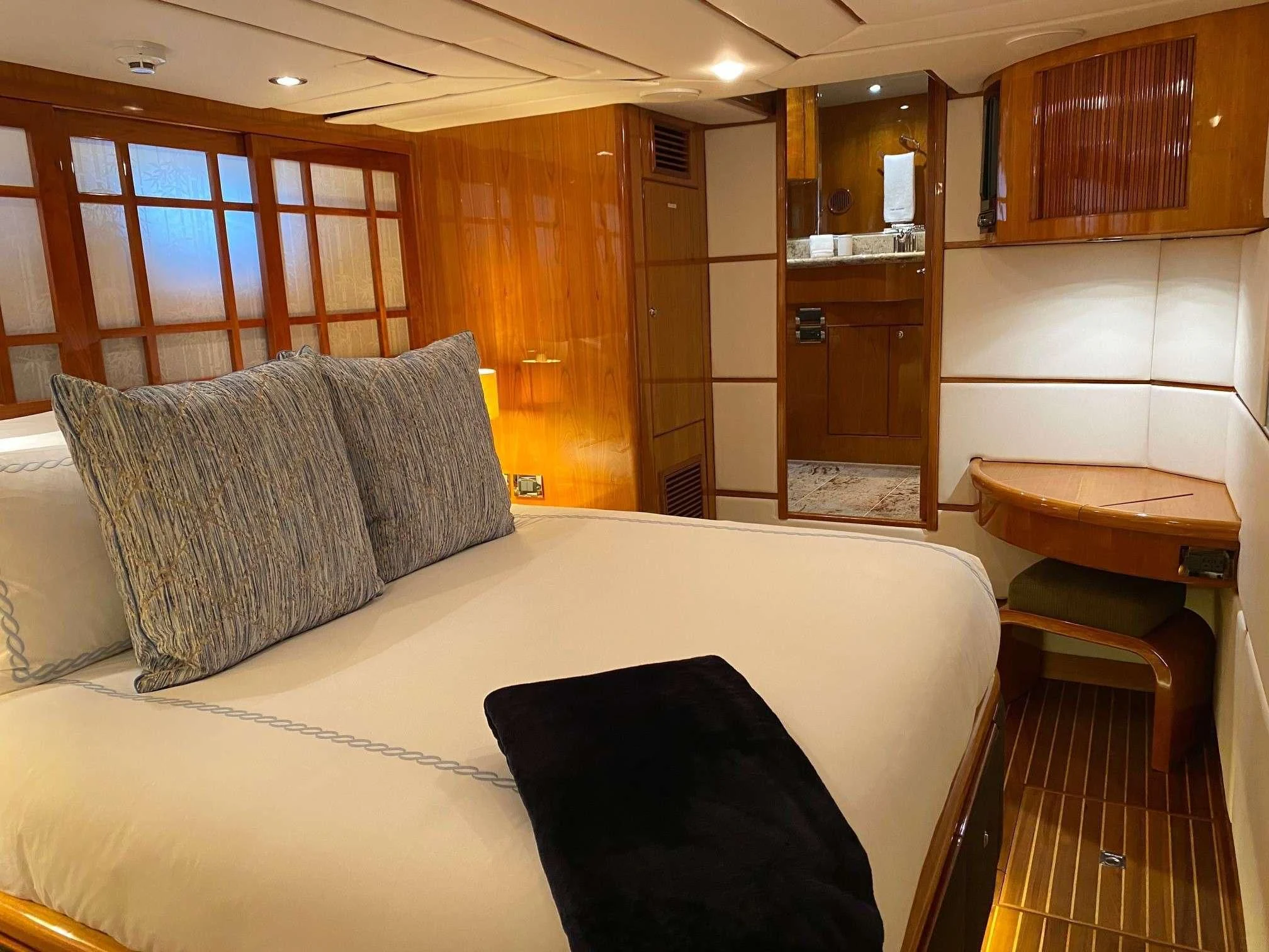 a bed in a room aboard SLIPAWAY Yacht for Sale