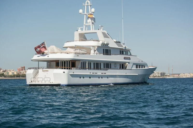 a large white boat in the water aboard SANORA Yacht for Sale