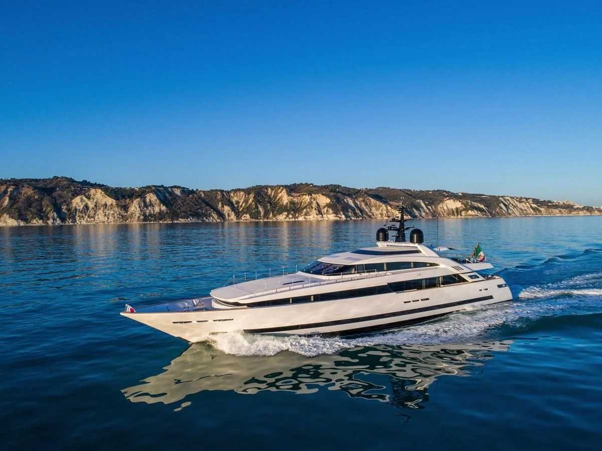 a white yacht on the water aboard AGORA III Yacht for Sale