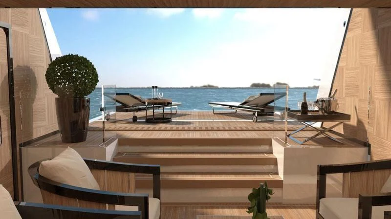 a window with a view of the water and a plane aboard AGORA III Yacht for Sale