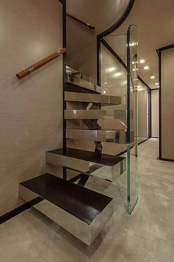 a set of stairs in a building aboard AGORA III Yacht for Sale