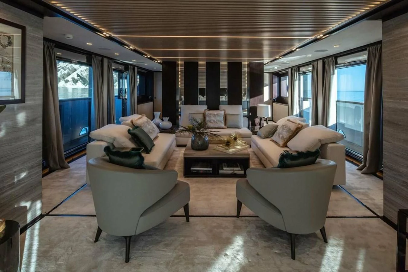 a living room with a large window aboard AGORA III Yacht for Sale