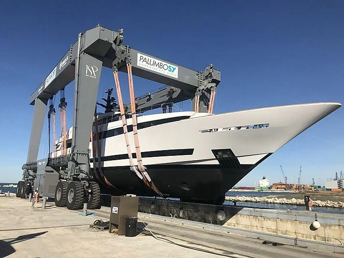 a large white boat on a trailer aboard AGORA III Yacht for Sale