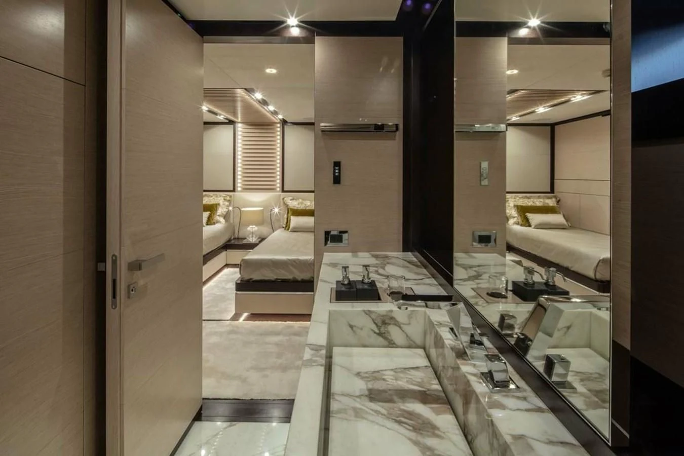 a room with a bed and a desk aboard AGORA III Yacht for Sale