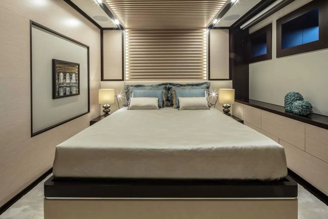 a bed with a white sheet aboard AGORA III Yacht for Sale