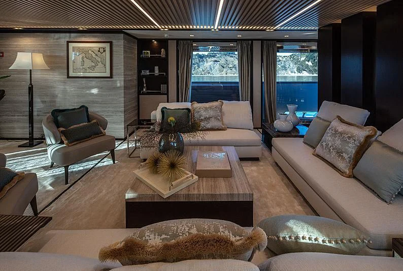 a living room with a large window aboard AGORA III Yacht for Sale