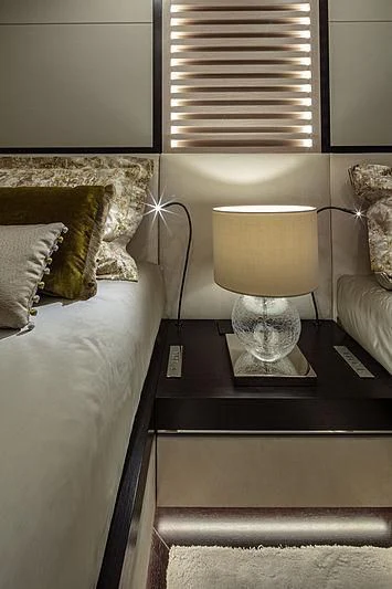 a small hotel room with a bed aboard AGORA III Yacht for Sale