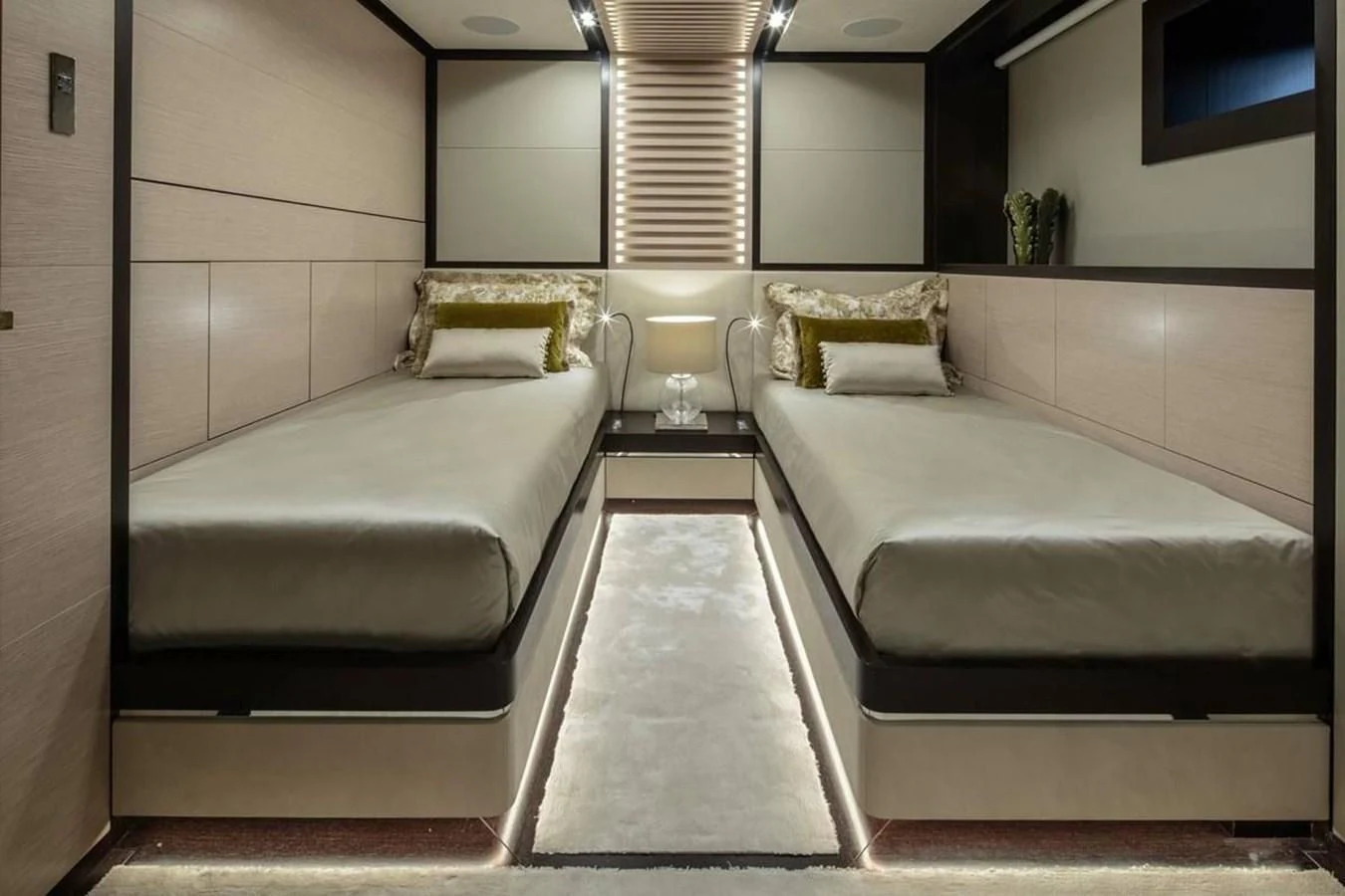 a room with two beds aboard AGORA III Yacht for Sale
