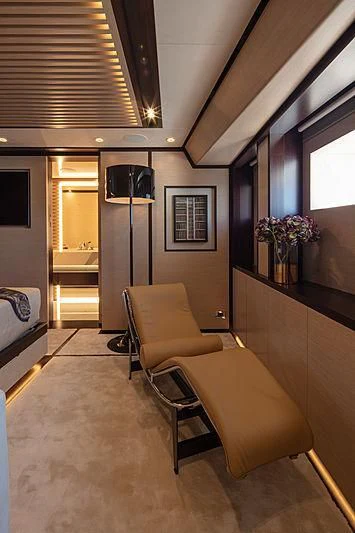 a room with chairs and a table aboard AGORA III Yacht for Sale