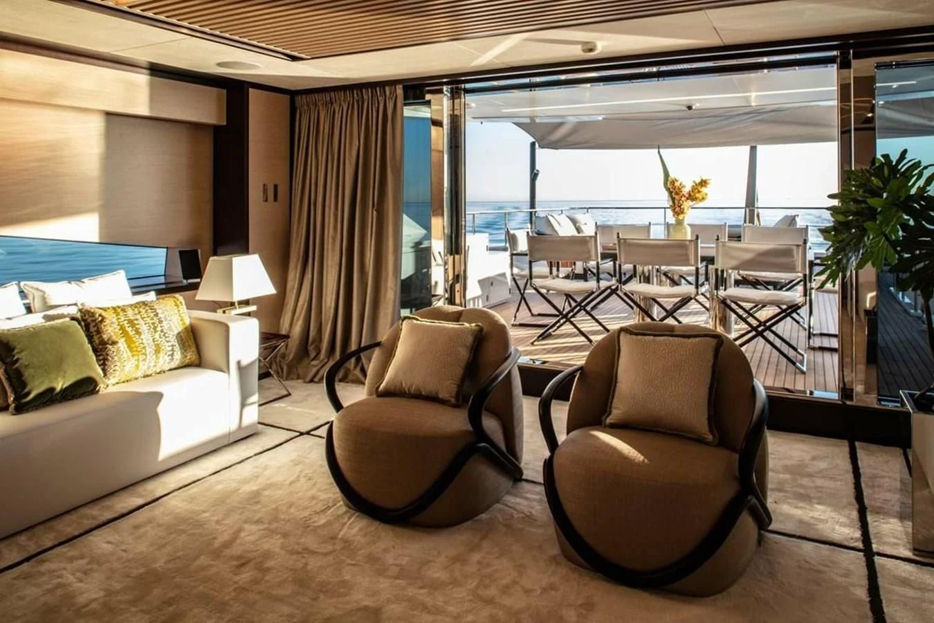 a room with a couch and chairs aboard AGORA III Yacht for Sale