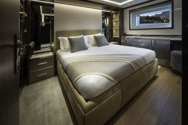 a bed in a room aboard ENTERPRISE Yacht for Charter