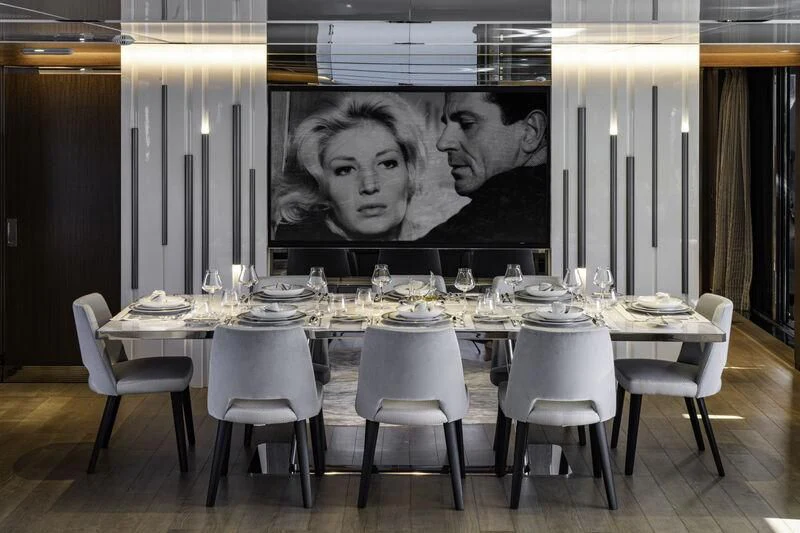 a table with a picture on it aboard ENTERPRISE Yacht for Charter