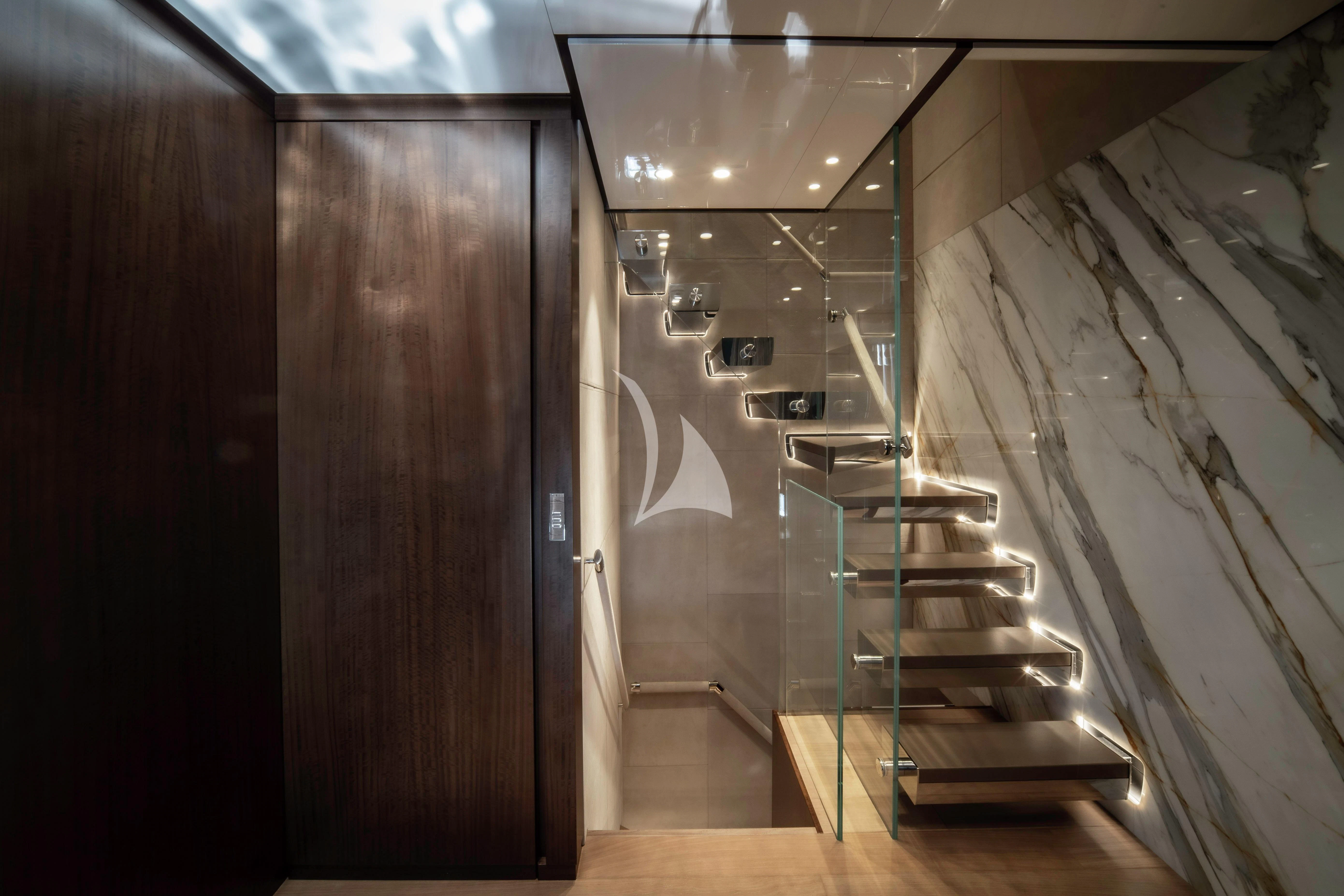a wooden room with a wooden door aboard ENTERPRISE Yacht for Charter
