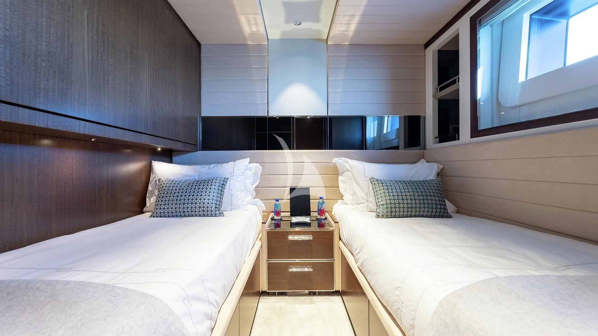 a room with two beds aboard ENTERPRISE Yacht for Charter