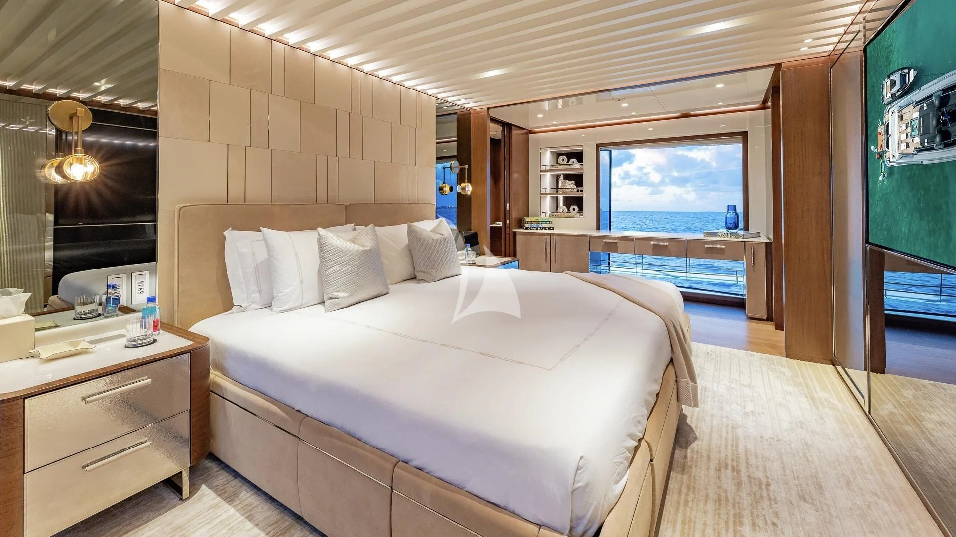 a room with a bed and a window aboard ENTERPRISE Yacht for Charter