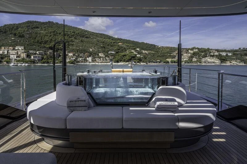 a boat on a deck aboard ENTERPRISE Yacht for Charter