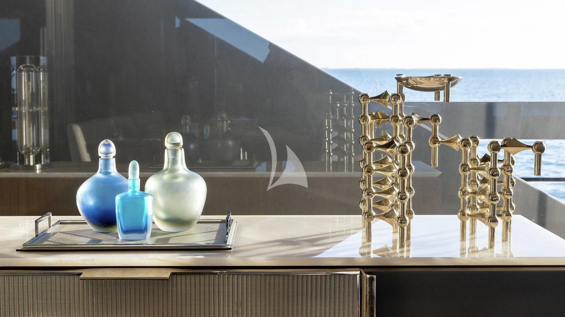 a shelf with a vase and a statue on it aboard ENTERPRISE Yacht for Charter