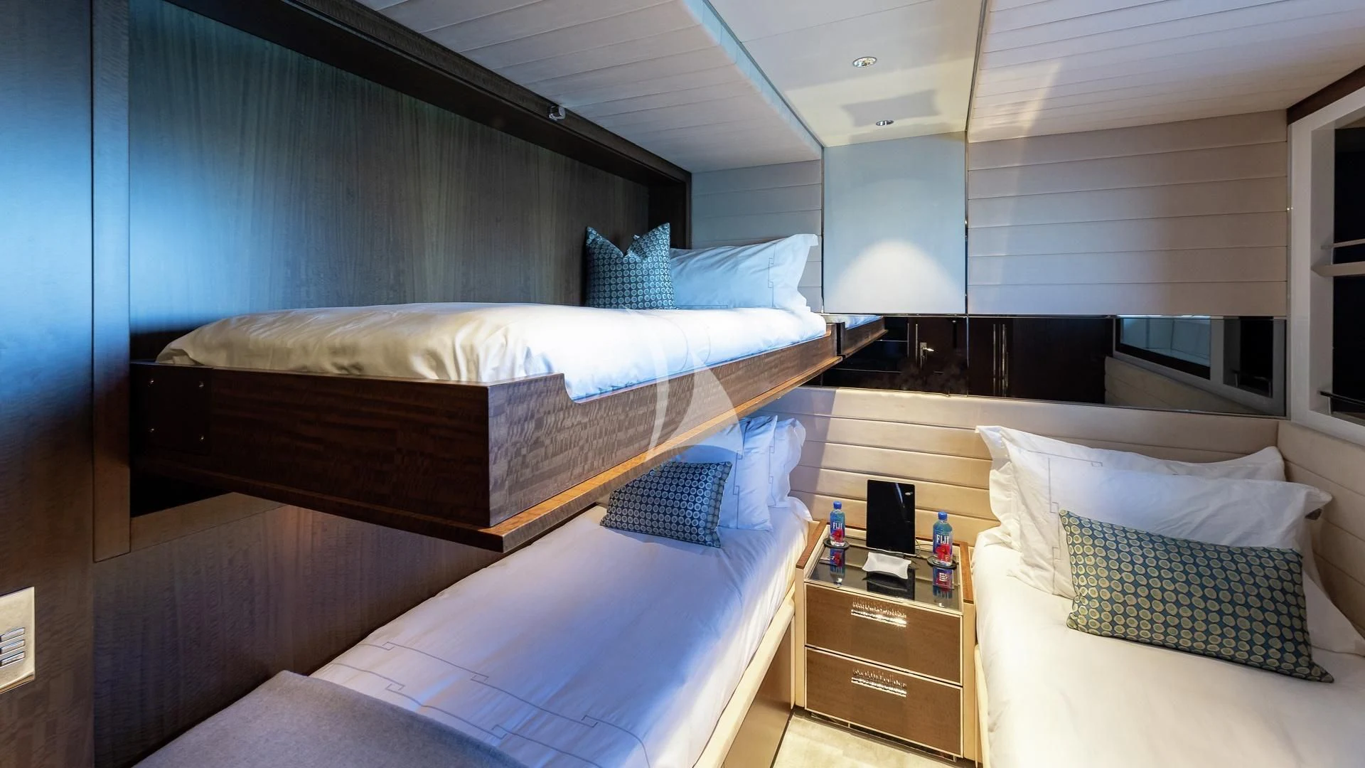 a room with two beds aboard ENTERPRISE Yacht for Charter