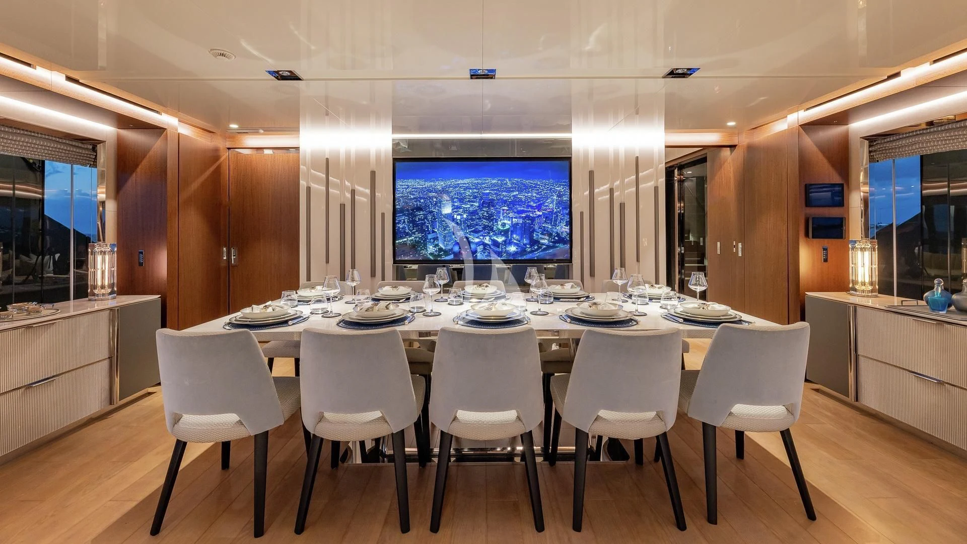 a large kitchen with white tables aboard ENTERPRISE Yacht for Charter