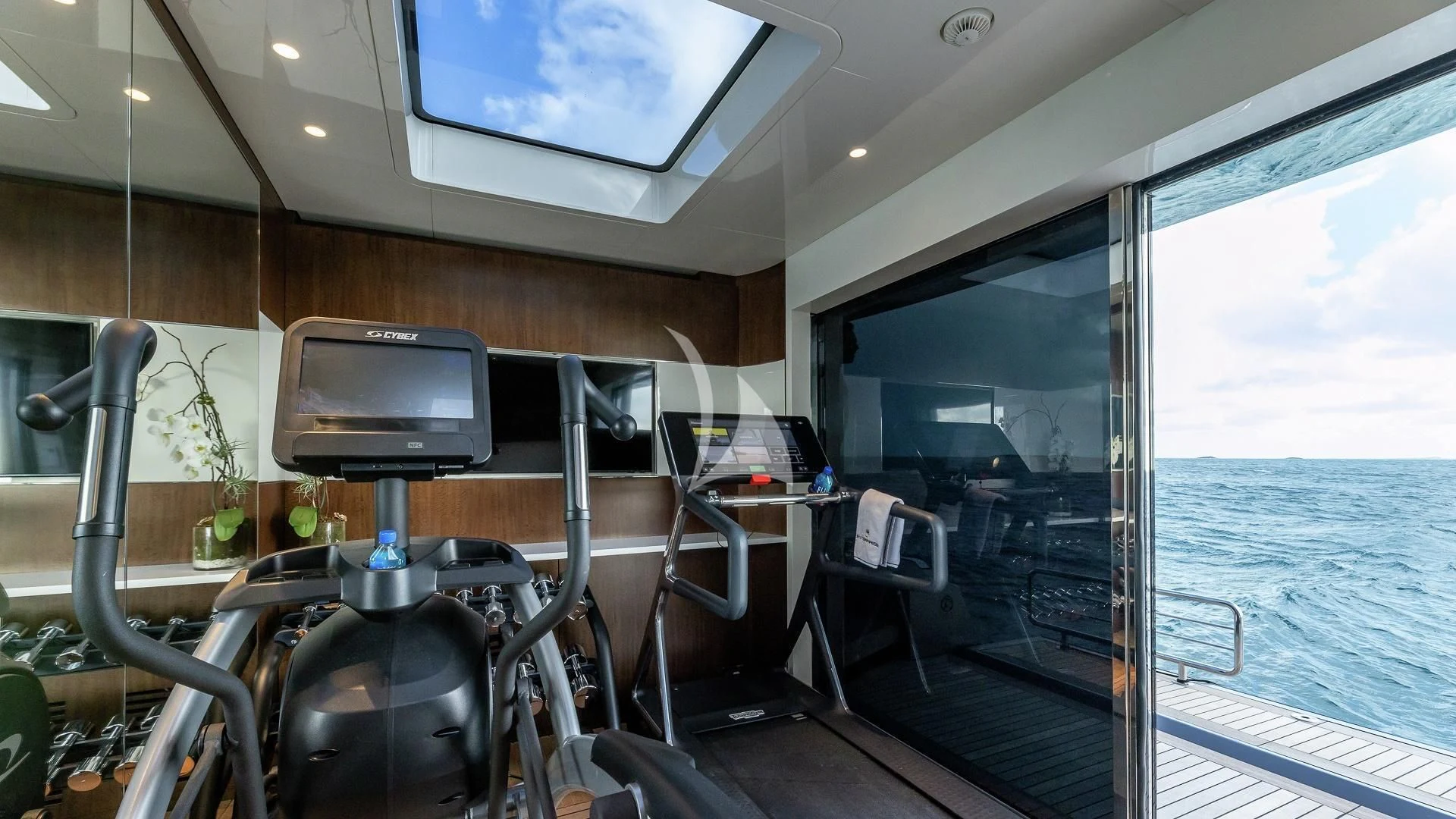 a boat with a tv and a large window aboard ENTERPRISE Yacht for Charter