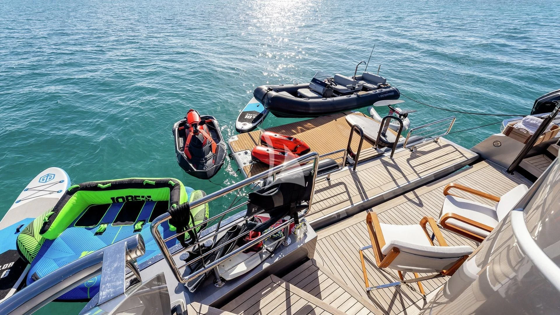 a boat with a boat on it aboard ENTERPRISE Yacht for Charter