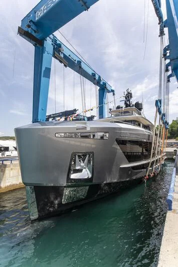 a large ship in the water aboard ENTERPRISE Yacht for Charter