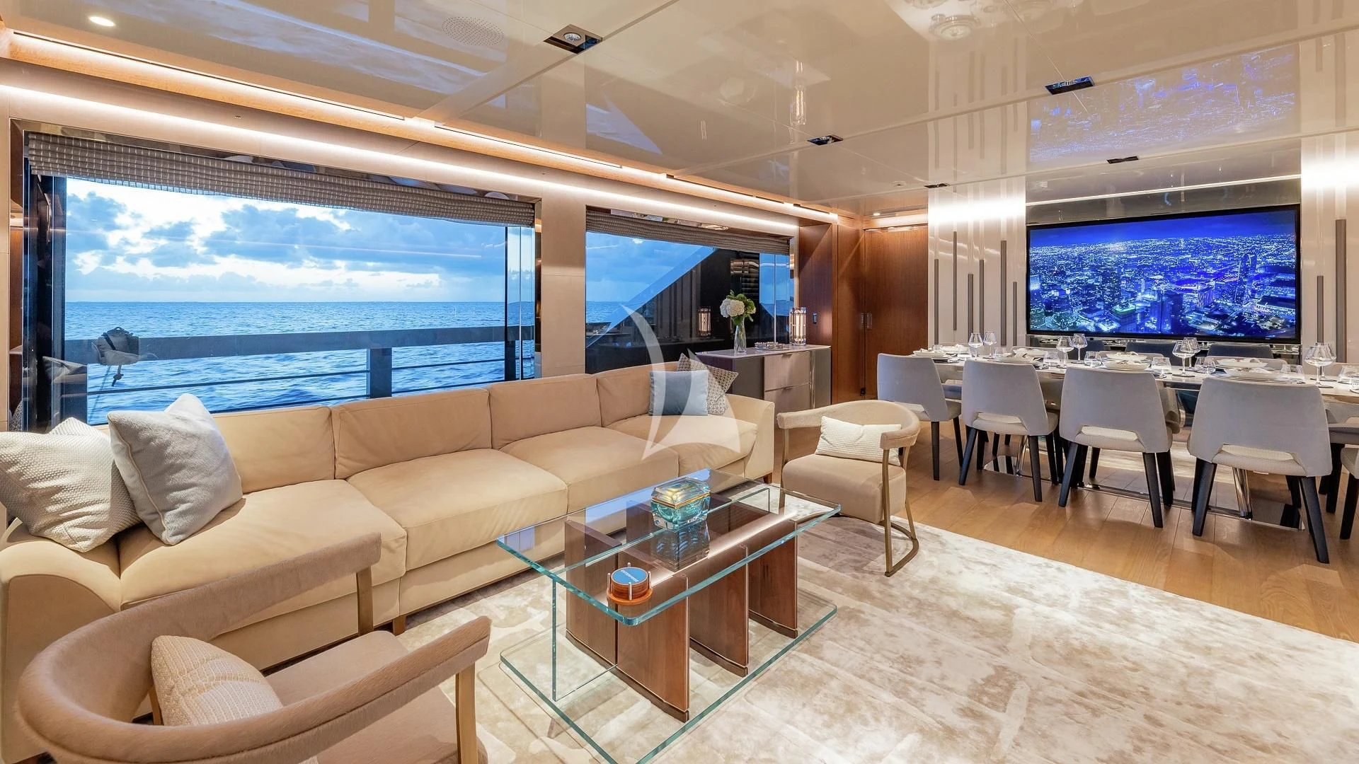 a living room with a large window aboard ENTERPRISE Yacht for Charter