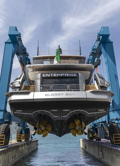 a large ship docked aboard ENTERPRISE Yacht for Charter