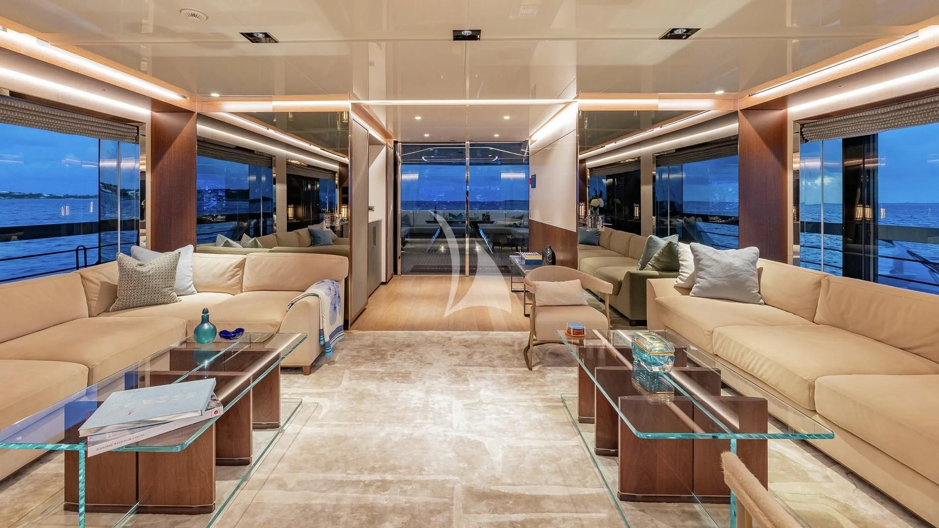a living room with a large window aboard ENTERPRISE Yacht for Charter