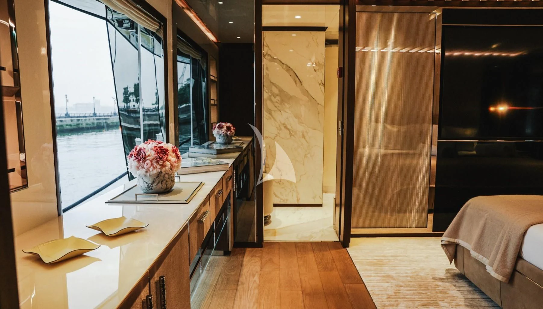a room with a large glass door aboard ENTERPRISE Yacht for Charter