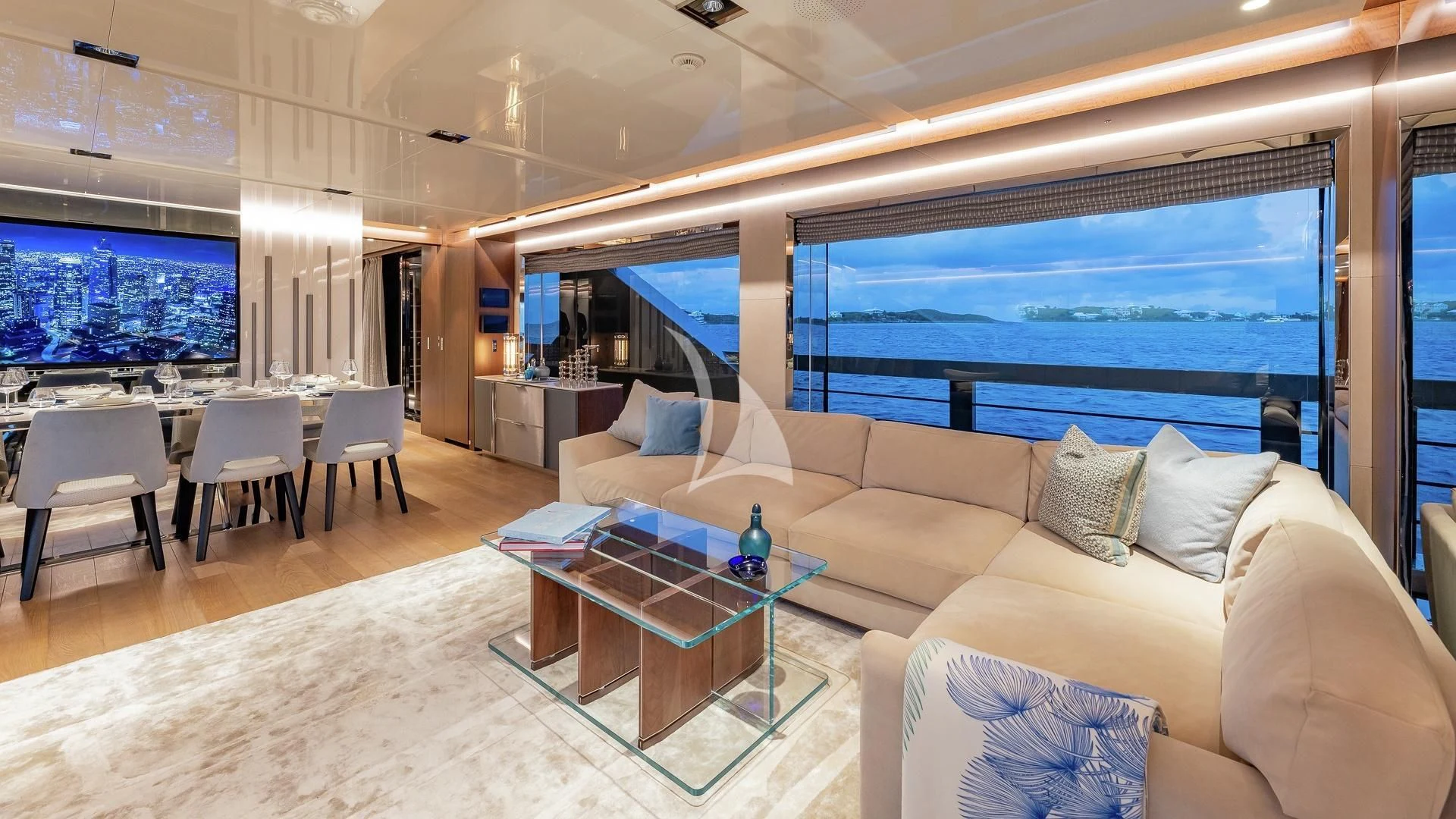 a living room with a large window aboard ENTERPRISE Yacht for Charter
