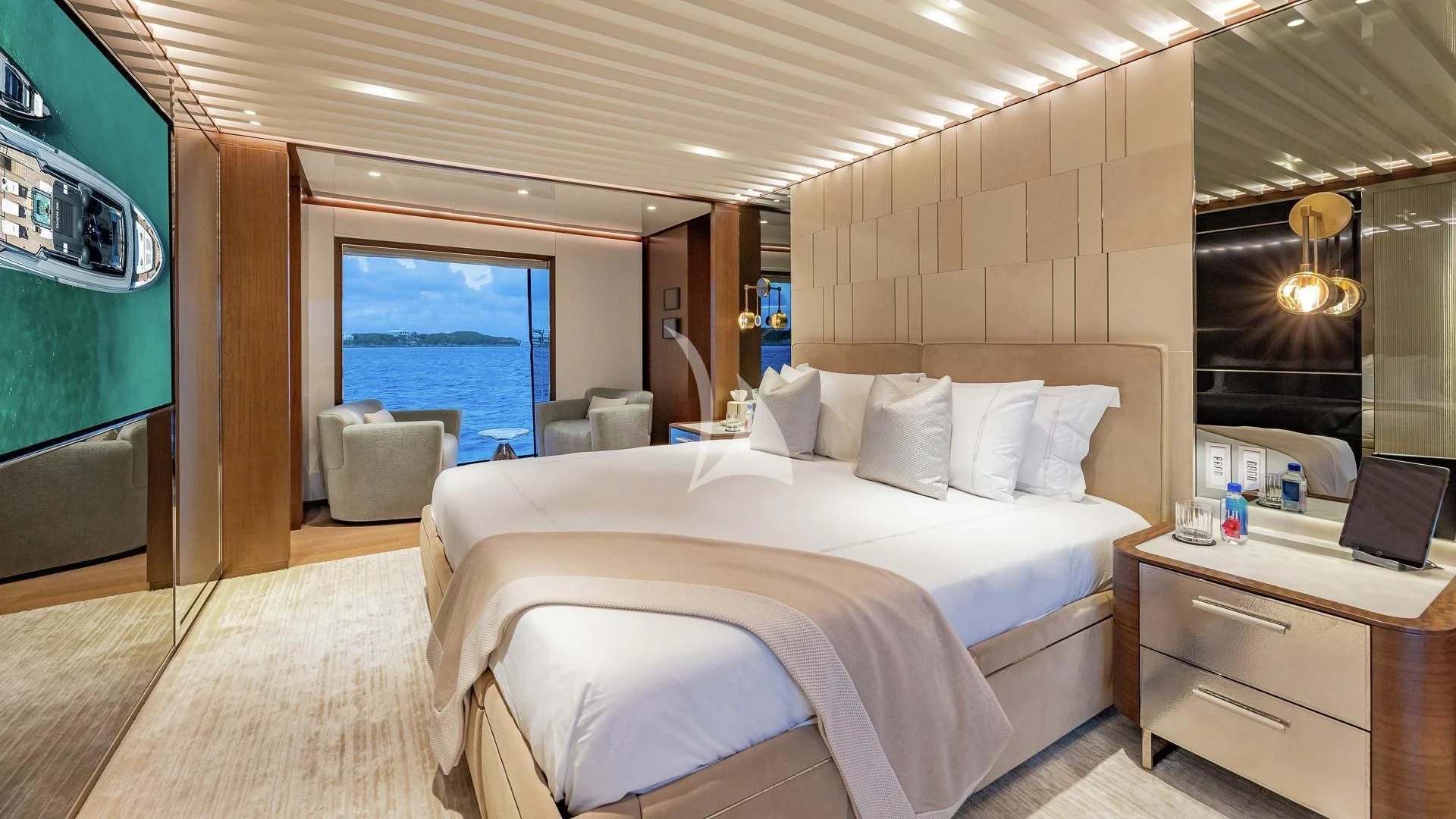 a room with a bed and a large window aboard ENTERPRISE Yacht for Charter