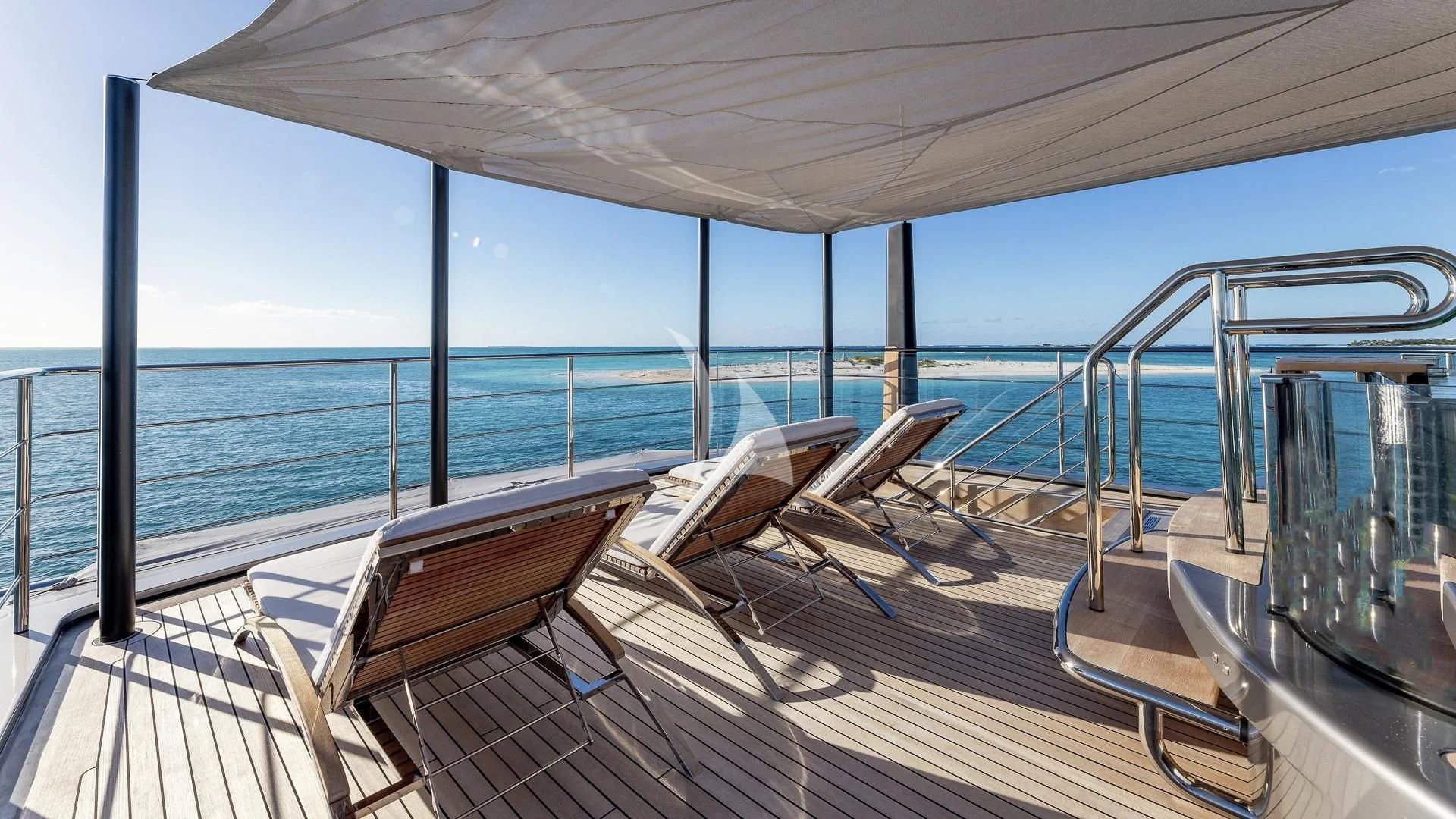 a deck with chairs on it aboard ENTERPRISE Yacht for Charter