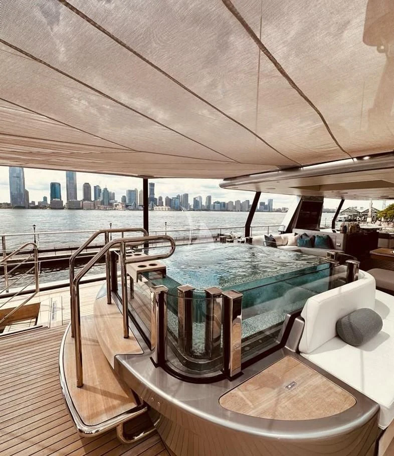 a table with chairs on it aboard ENTERPRISE Yacht for Charter