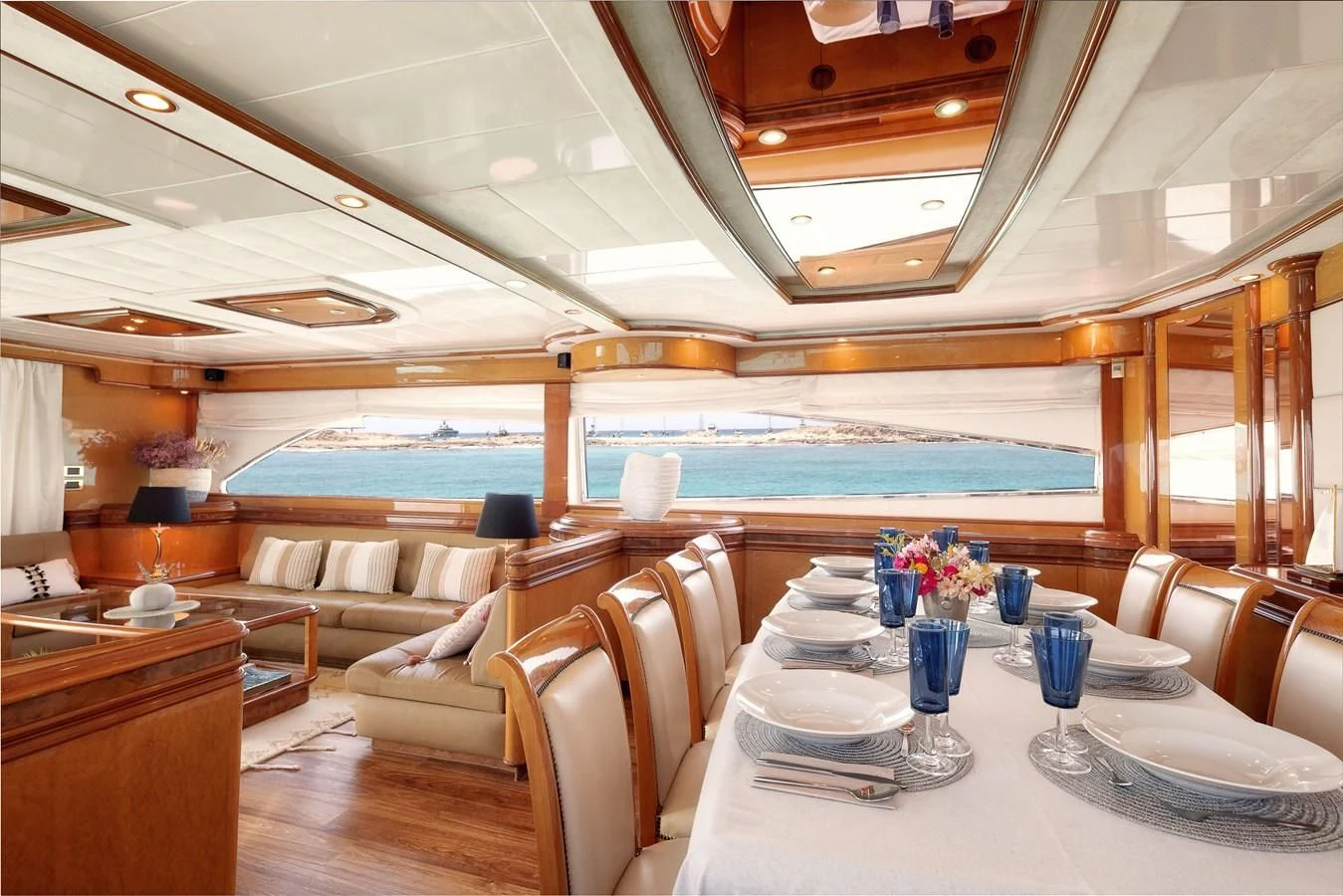 a room with a table and chairs aboard NEPHENTA PRIMERO Yacht for Sale