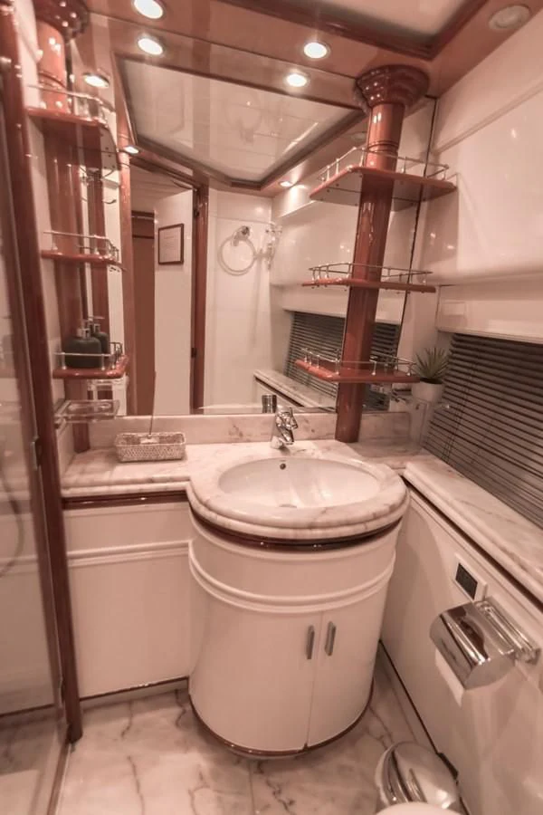 a bathroom with a sink and a toilet aboard NEPHENTA PRIMERO Yacht for Sale