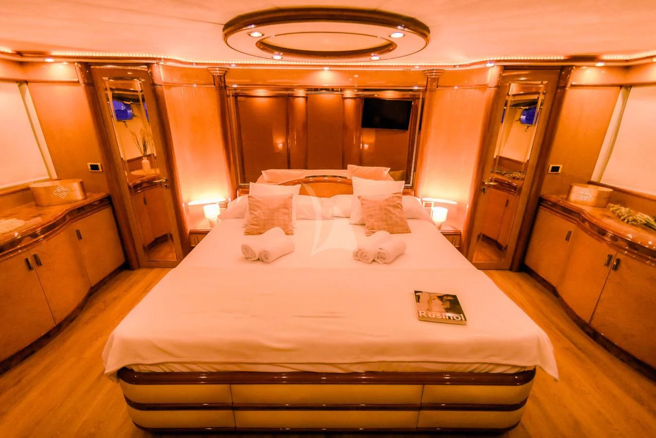a bed with white sheets aboard NEPHENTA PRIMERO Yacht for Sale