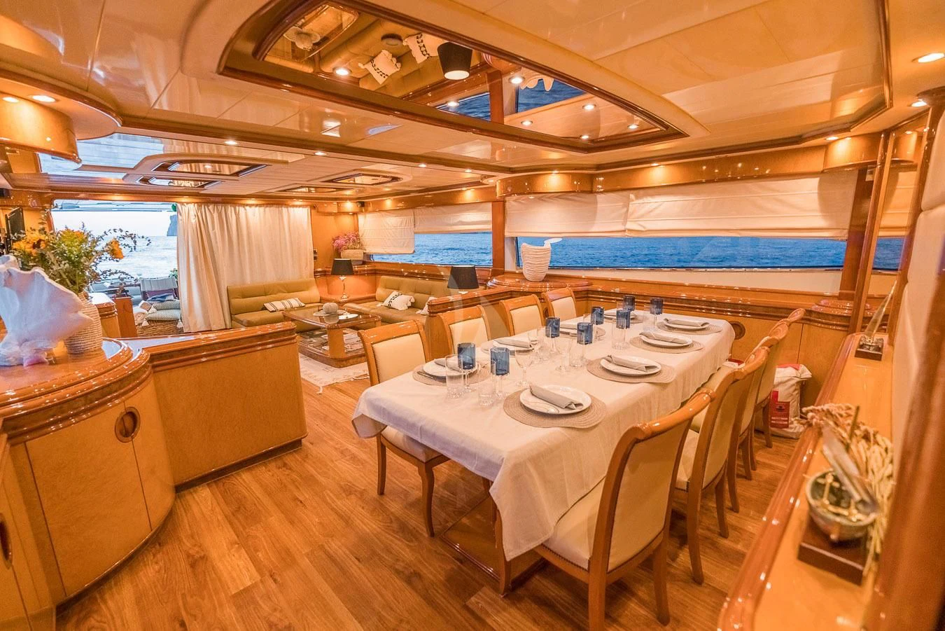 a large kitchen with a dining table aboard NEPHENTA PRIMERO Yacht for Sale