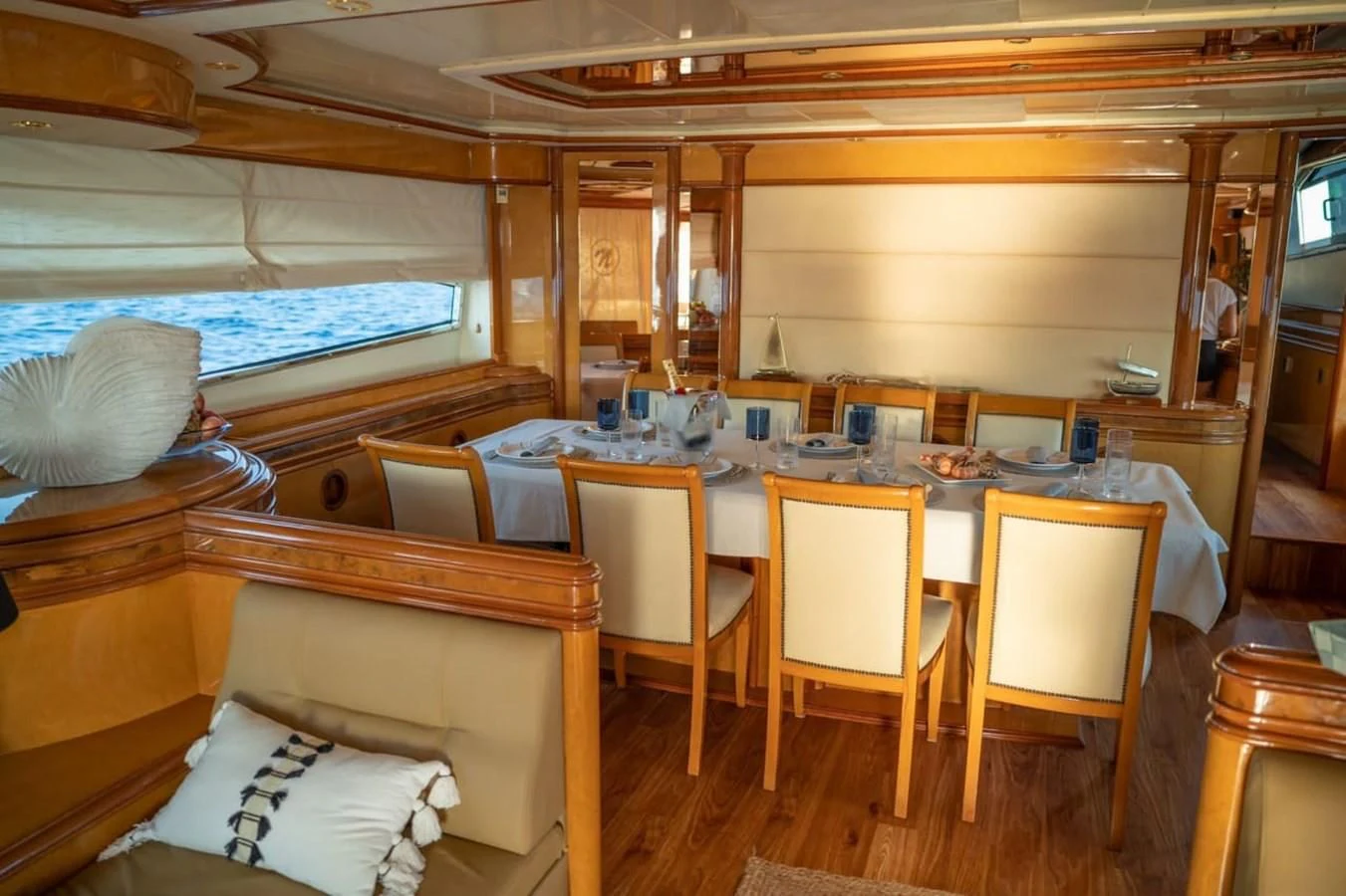 a room with a table and chairs aboard NEPHENTA PRIMERO Yacht for Sale